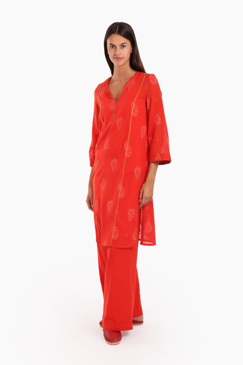 Embroidery tunic with contrast color piping in printed cotton voile